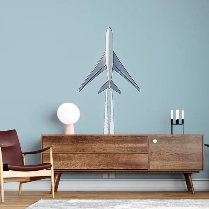 Must-Have Papier peint avion Un avion survolant un ciel bleu clair